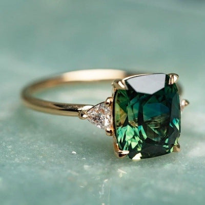 Gold Emerald Solitaire Ring